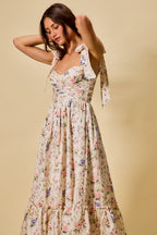 Vestido midi de algodón con corpiño fruncido, estampado floral, con lazo en la parte delantera y forro.